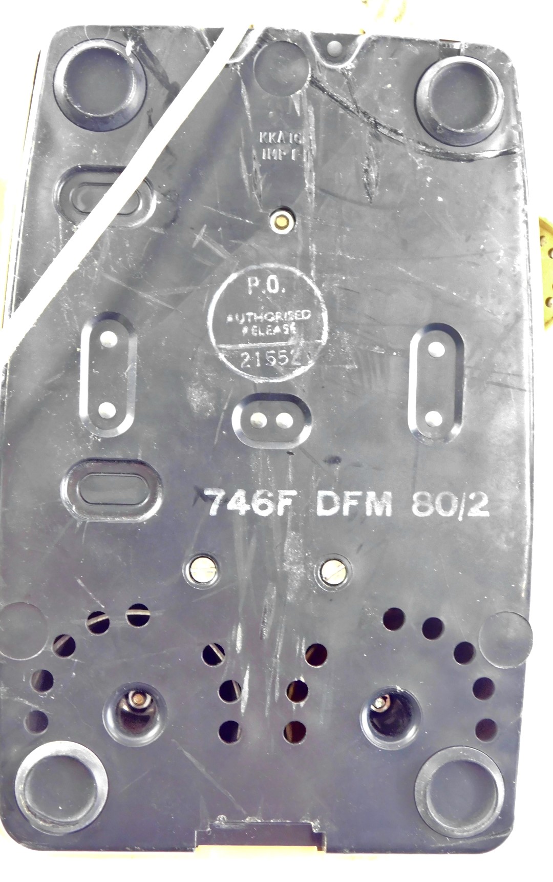 A mustard coloured vintage plastic telephone, stamped 746F, DFM, 80/2. - Image 2 of 2