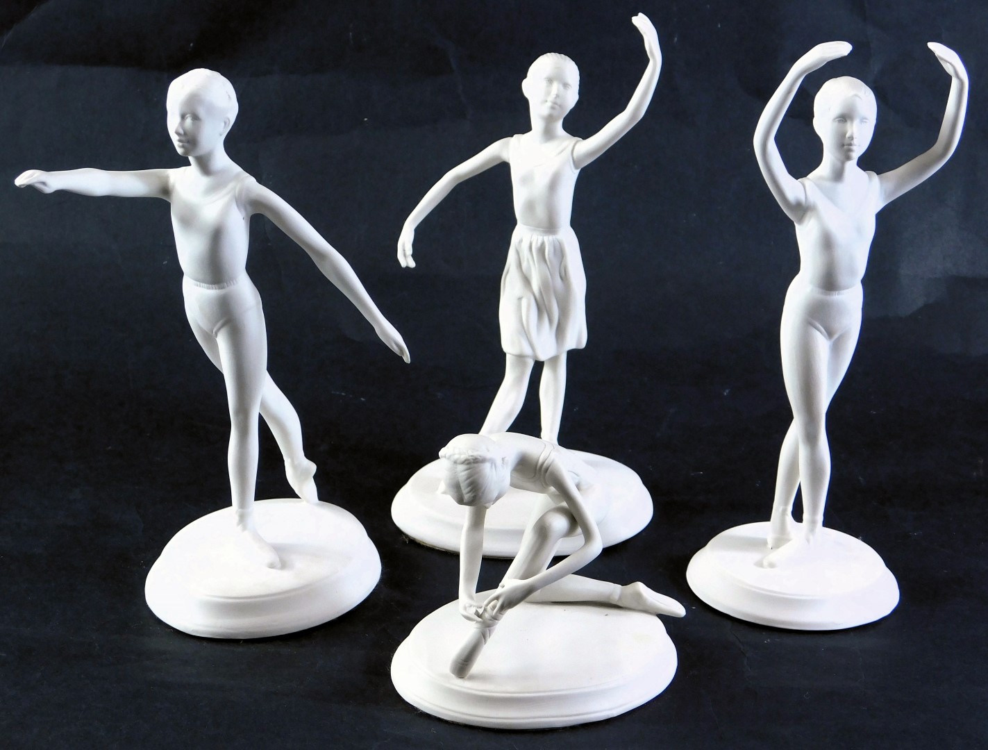 Four Franklin porcelain Royal Ballet figures, designed by Brenda Naylor, the tallest 20cm high.