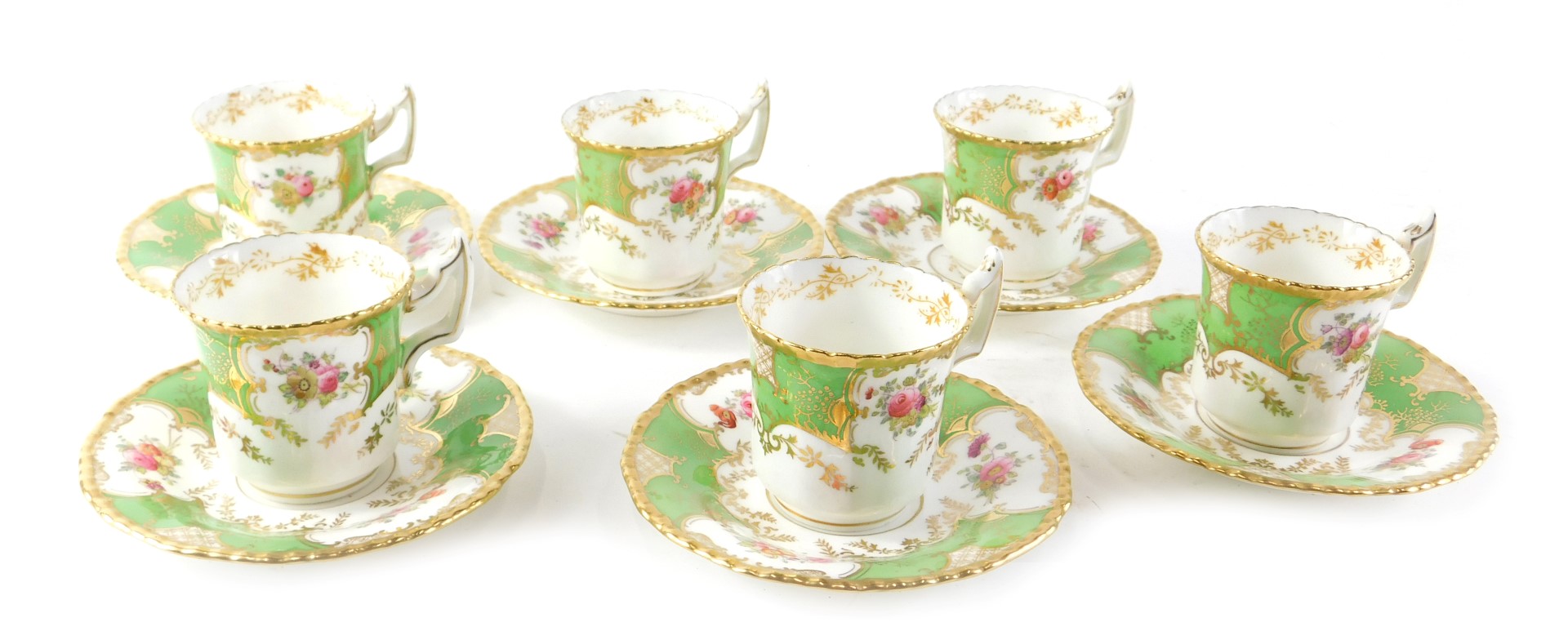 A Coalport coffee service, printed with flower sprays, within gilt and green bands.