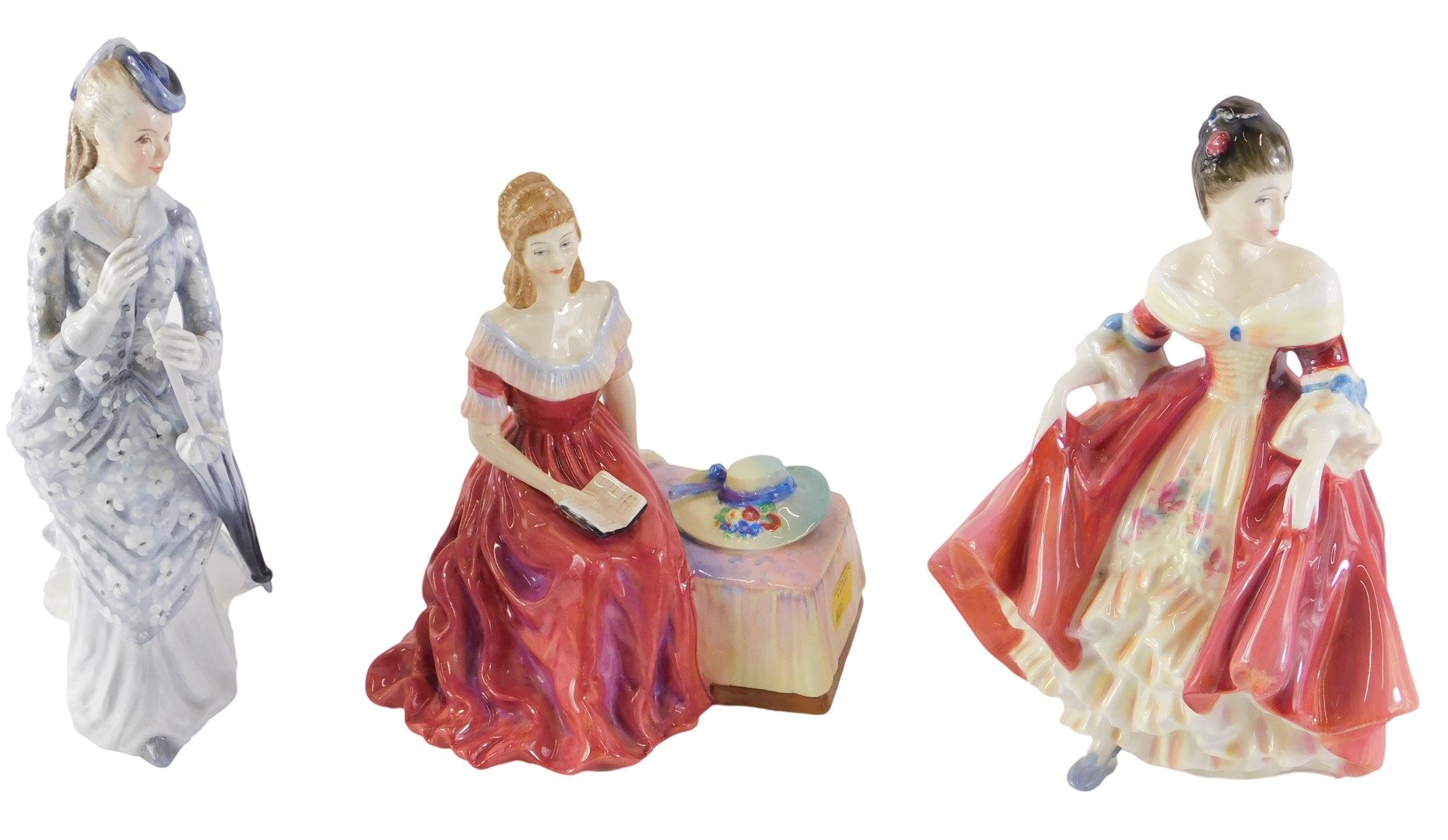 Three Doulton figures, comprising a Royal Doulton Southern Belle, HN2229, 19cm high, a Petite Ladies