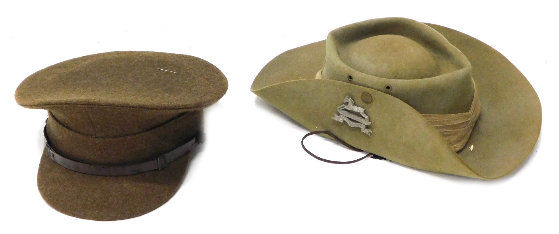 A Royal Artillery cap, and a West Yorkshire Regiment Australian style hat. (2)