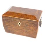 A Victorian yew sarcophagus shaped tea caddy, the hinged lid enclosing two lidded divisions flanked