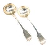 A pair of silver fiddle pattern toddy ladles, each bearing the initial D, George W Adams, London 185