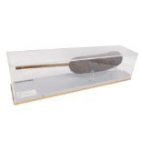 Tribal Art. An Egyptian loot musical instrument, 53cm wide, in presentation Perspex case.