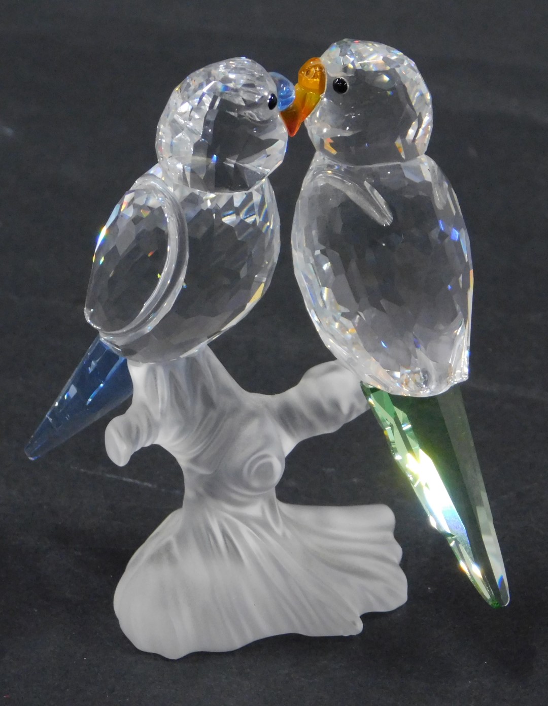 A Swarovski crystal figure group of two birds on perch, with coloured glass tails and beaks, 9cm hig - Image 2 of 2