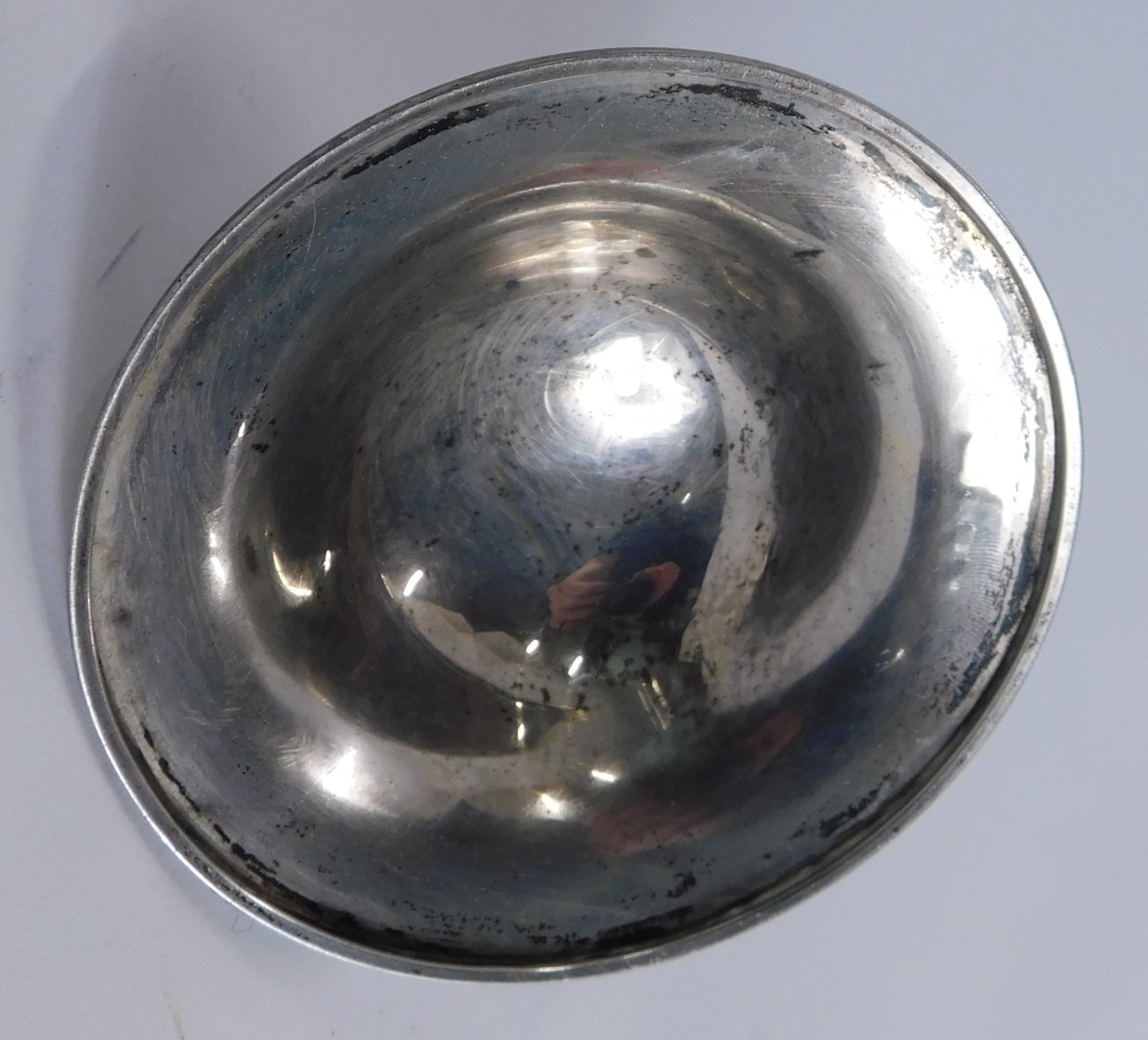 Two items of silver, comprising a George V silver jar top, and a white metal candle stand top, with - Image 3 of 3