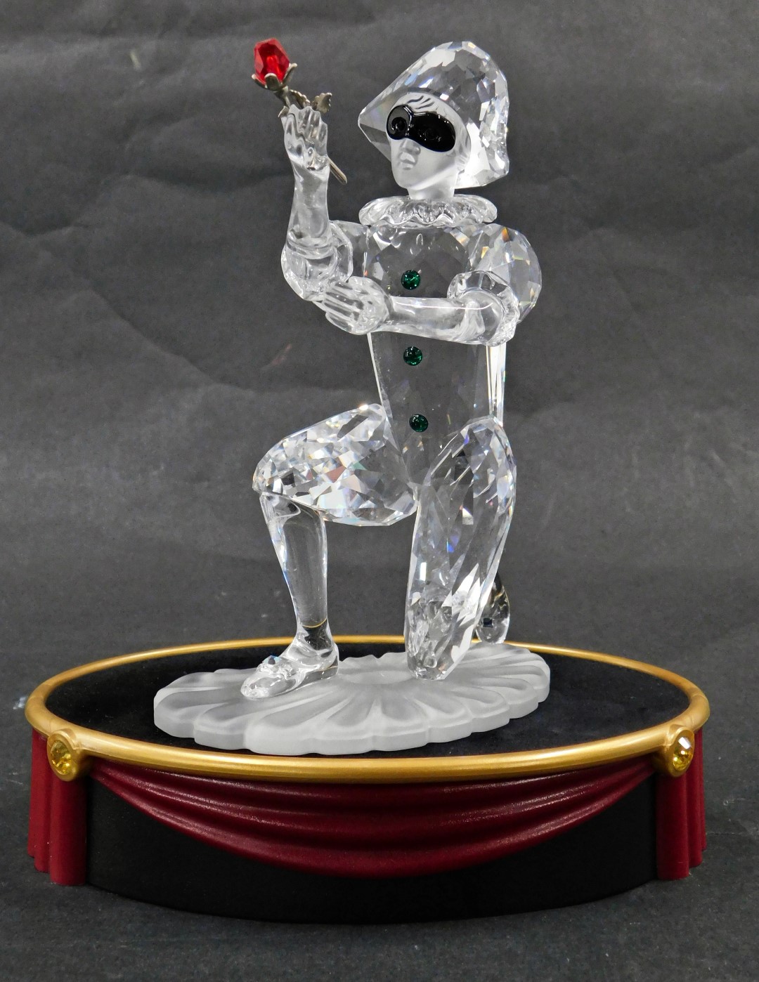 A Swarovski crystal Masquerade Harlequin figure, annual edition for 2001, boxed with certificate, 13