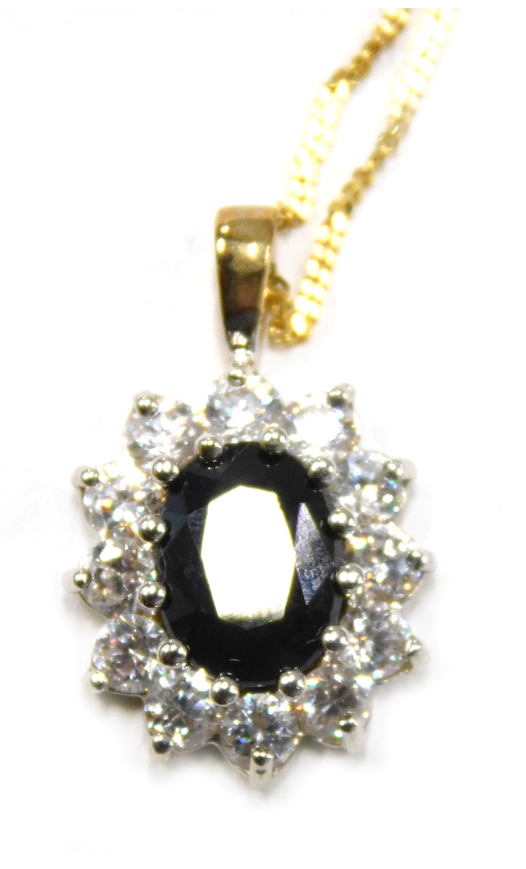 A pendant and chain, the floral cluster pendant set with imitation sapphire and diamond, 2cm high, o
