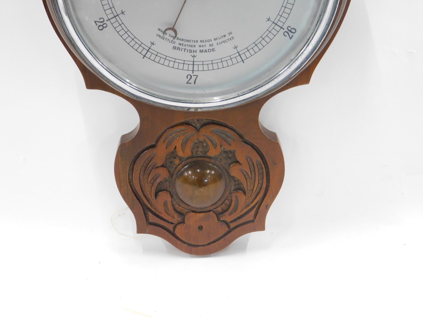 An Edwardian mahogany aneroid wheel shaped barometer with thermometer, in a carved case, 82cm high. - Image 4 of 4