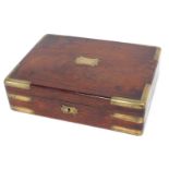 A 19thC mahogany and brass bound rectangular box, with vacant cartouche, possibly for guns, 25cm wid
