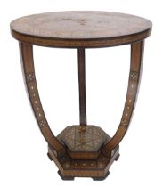 A late 19th/early 20thC Middle Eastern occasional table, the mosaic style top inlaid with various ti