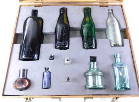 A collection of 19thC and later glass bottles, to include Lions Ink, Stoke On Trent bottles, Doncast