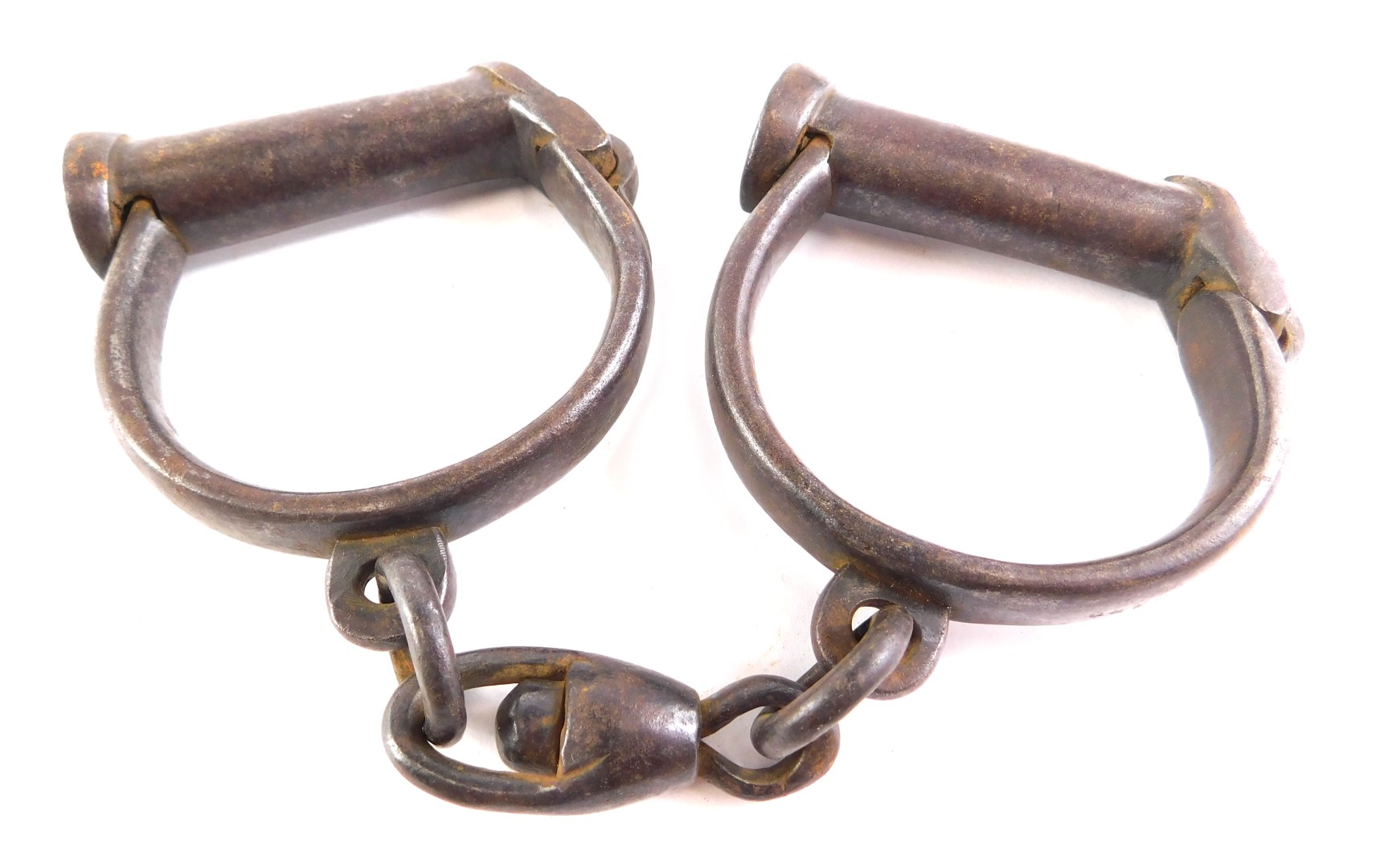 A pair of 19thC Victorian cast iron handcuffs.