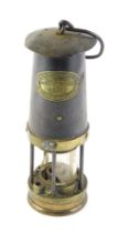 A John Davis & Son of Derby mining safety lamp, type 2, 26cm high. (Glass AF)