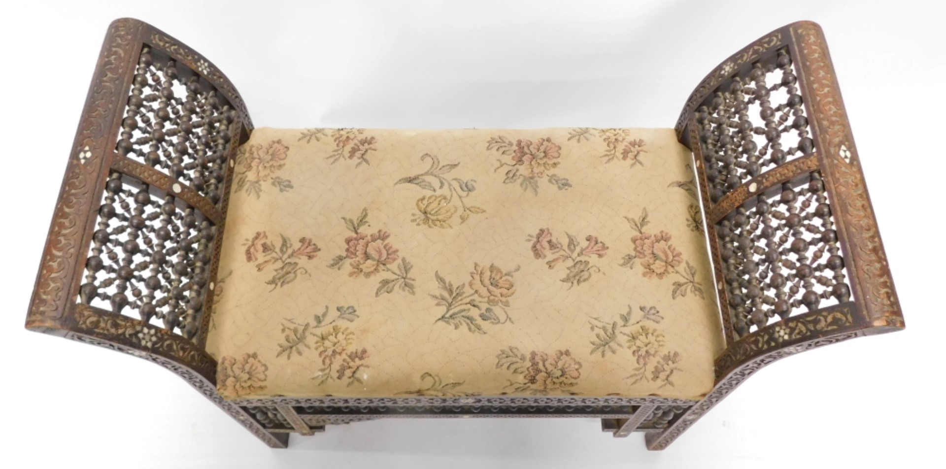 A late 19th/early 20thC Moorish design stool or window seat, inlaid with mother of pearl and with ca - Image 2 of 3