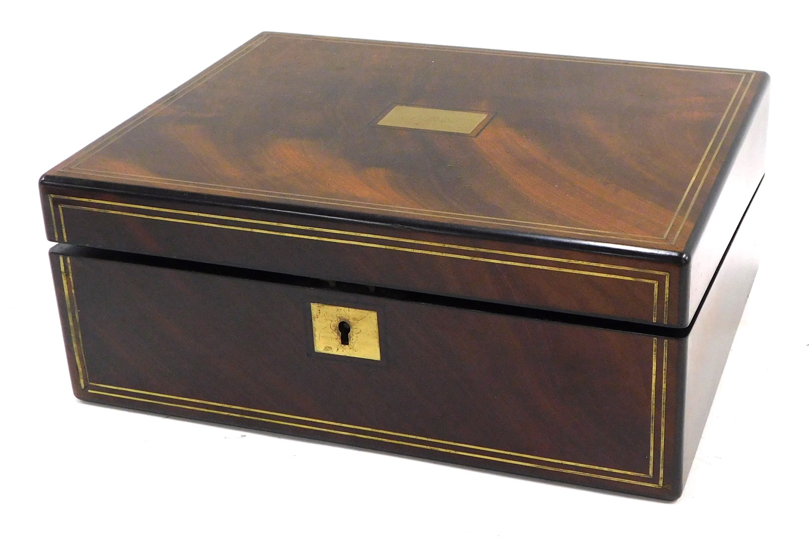 A 19thC mahogany and brass strong writing box, the hinged lid engraved with a rectangular plaque J P