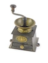 A J & W Findlay of Liverpool cast iron and brass coffee mill or grinder, 12cm wide.