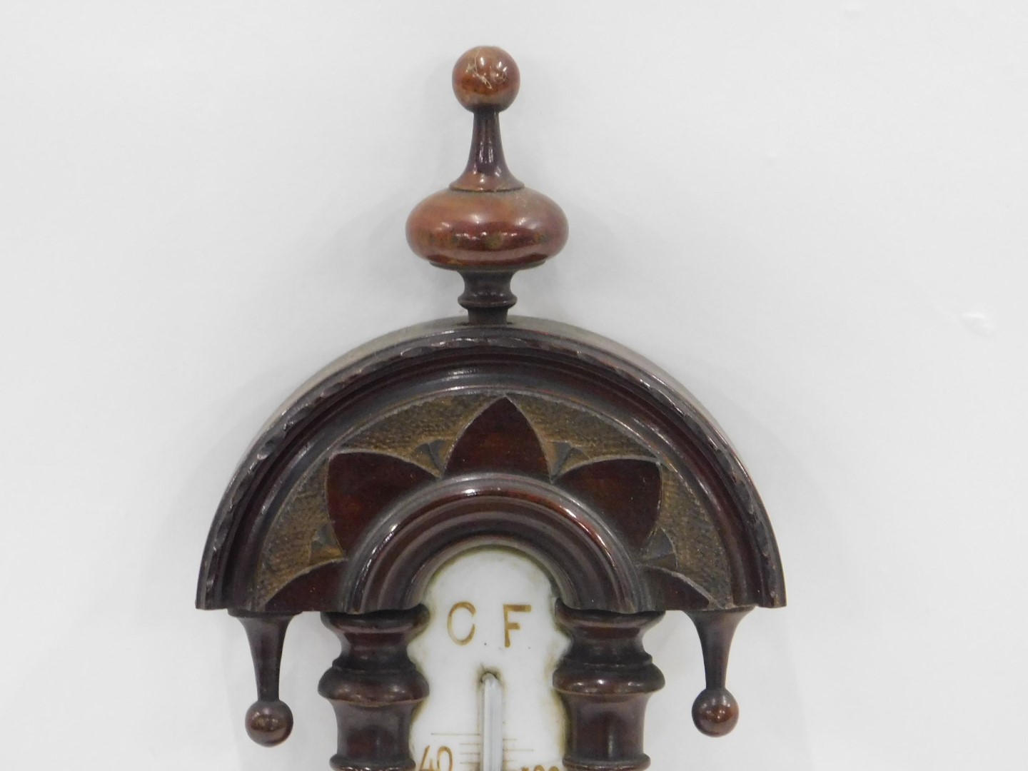 An early 20thC carved mahogany cased aneroid barometer, with opaque glass thermometer, 51cm high. - Image 3 of 3