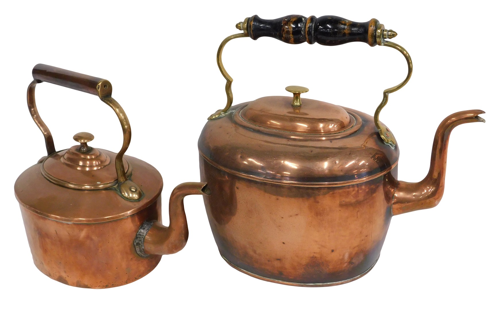 A Victorian oval copper kettle, with ebonised handle, and another copper kettle. (2)