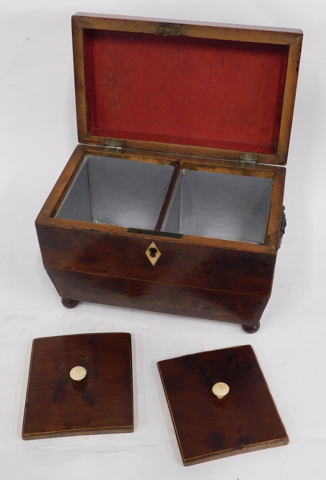 A Victorian yew sarcophagus shaped tea caddy, the hinged lid enclosing two lidded divisions, lacking - Image 2 of 2