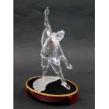 A Swarovski crystal Masquerade Pierro 1999 Edition figure, 20cm high, boxed, with display stand.