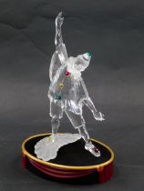 A Swarovski crystal Masquerade Pierro 1999 Edition figure, 20cm high, boxed, with display stand.