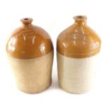 A stoneware flagon stamped R Summersby Grantham, 40cm high (AF), and another stamped Whitton and Ash