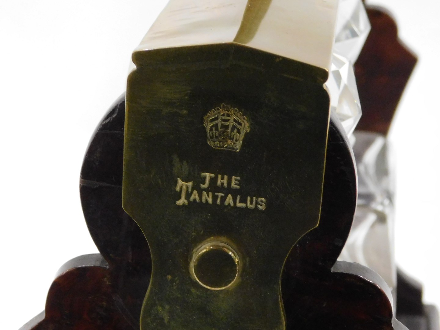 A 19thC Betjemann's Patent walnut and brass Tantalus, with four square section decanters and stopper - Image 3 of 4