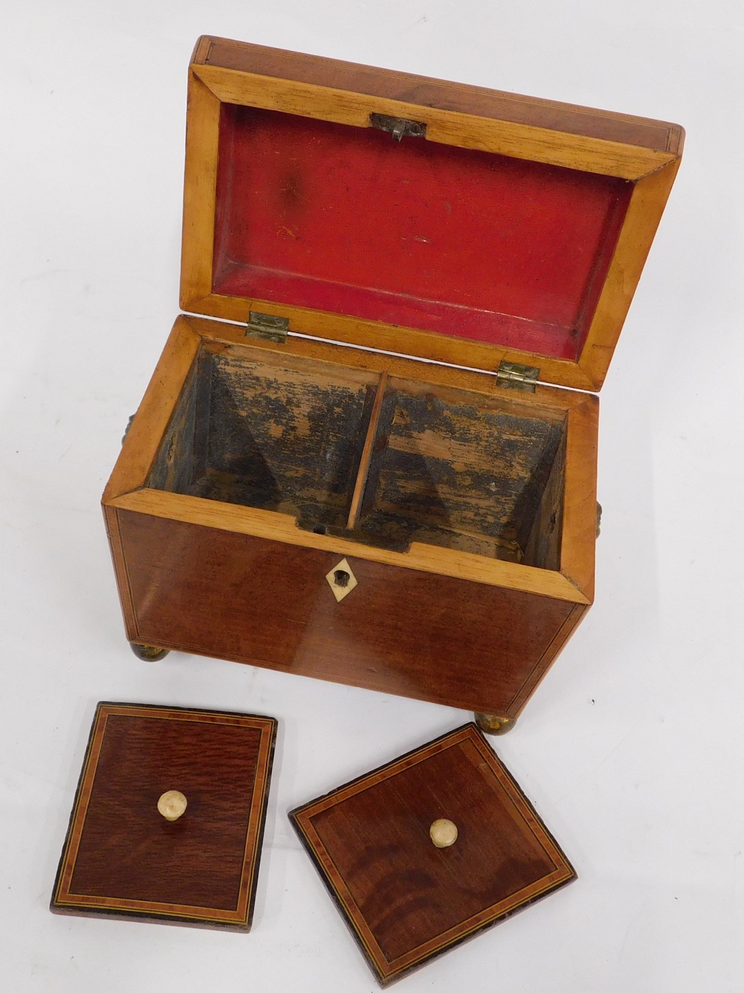An early 19thC partridge wood tea caddy, the hinged lid enclosing two lidded divisions, on ball feet - Image 2 of 3