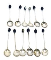 A set of twelve matched silver coffee bean teaspoons, 2.29oz. (AF)