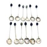 A set of twelve matched silver coffee bean teaspoons, 2.29oz. (AF)