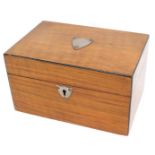 A Victorian walnut and ebony strung workbox, the hinged lid applied with a silver plated shield shap