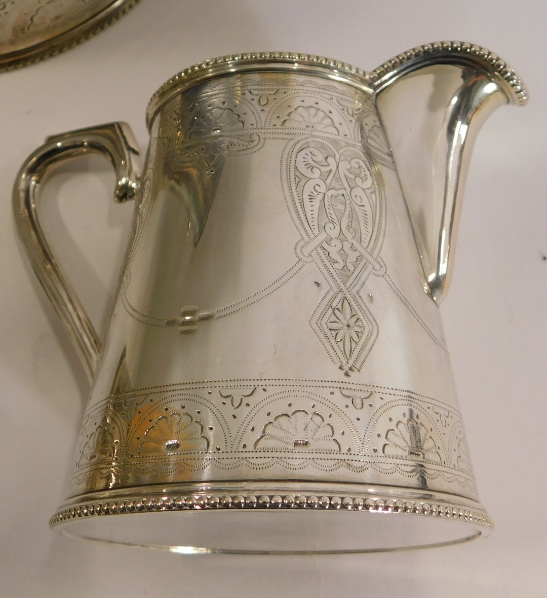 An early 20thC silver plated four piece tea and coffee service, with bright cut fan and scroll detai - Bild 3 aus 3