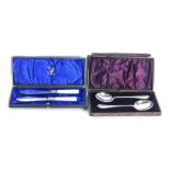 Two presentation sets, comprising a mother of pearl and silver plated knife set, in G Seiffert of Du