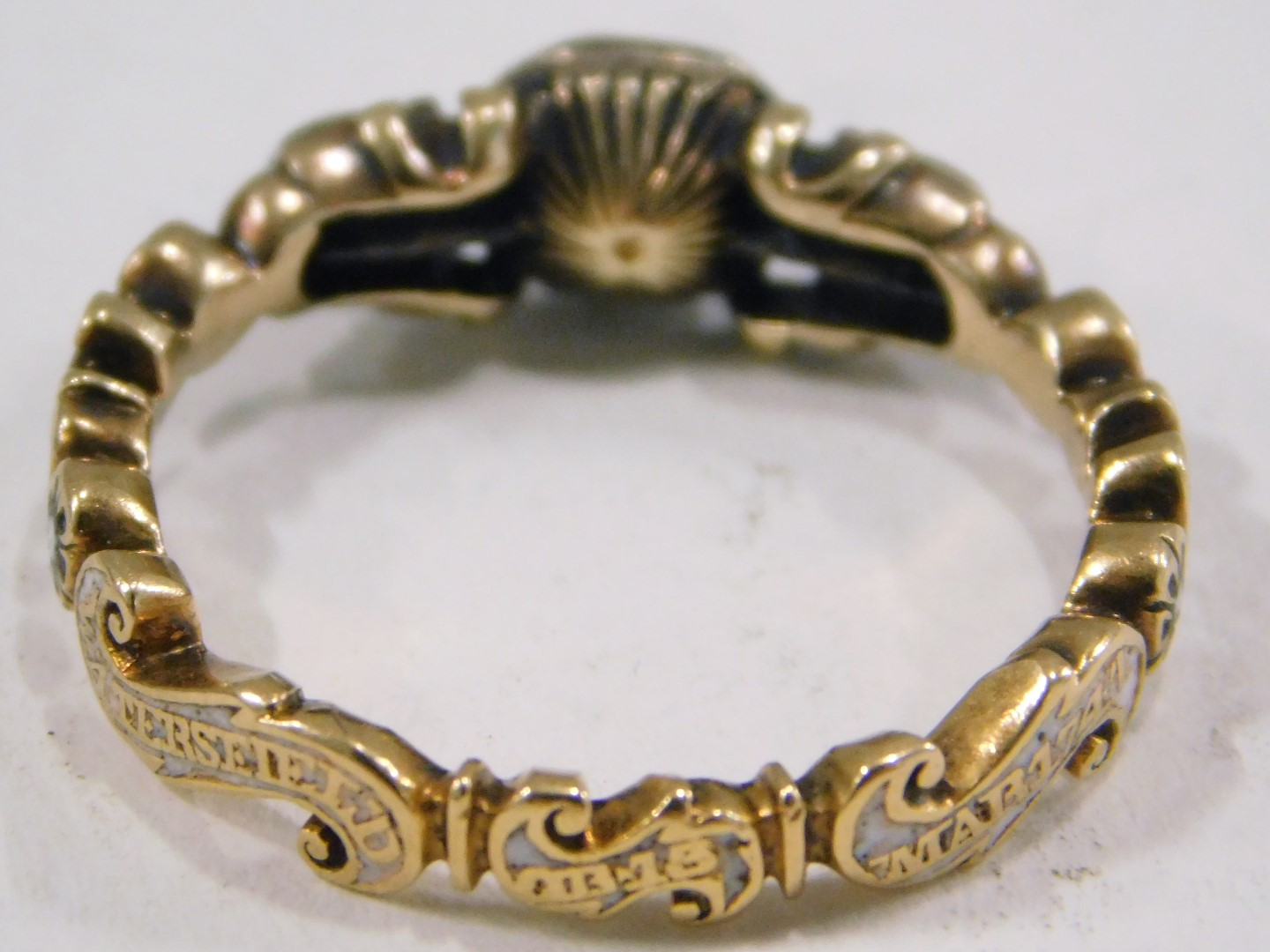 A Victorian memorial dress ring, set with three foil backed old cut imitation diamonds, with enamel - Image 3 of 3