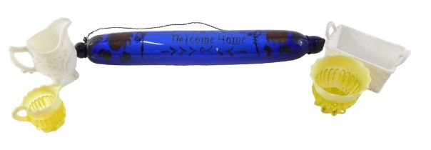 A 19thC Bristol blue glass rolling pin, bearing the slogan Welcome Home, 43cm wide, and four items o