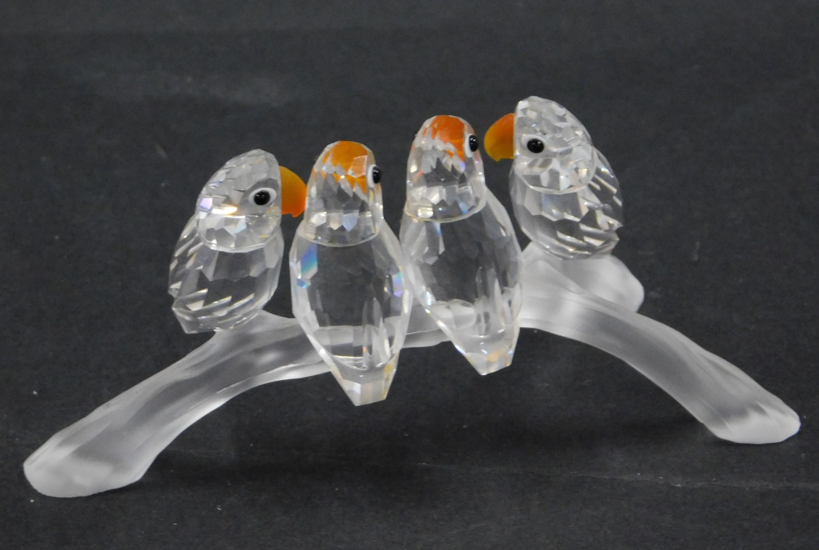 A Swarovski crystal figure group, of four parakeets on perch, each with an orange and yellow crystal - Image 2 of 2