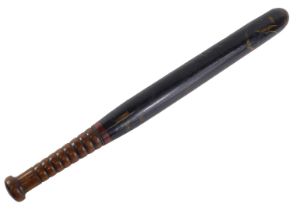 A Victorian ebonised police truncheon, numbered 180, 45cm long.