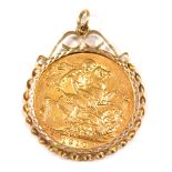 An Edward VII full gold sovereign pendant, dated 1910, in a 9ct gold twist work pendant mount, 9.1g
