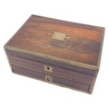 A Victorian rosewood and brass bound campaign style dressing table case, the top with a vacant brass