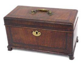 A 19thC mahogany tea caddy, the hinged lid with cross banded border and a brass swing handle enclosi