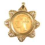 A young Victoria head full gold sovereign pendant, dated 1876, in a 9ct gold star mount, 12.3g all i