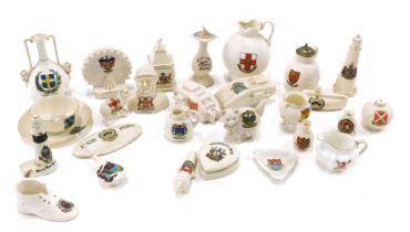 A quantity of crested china, to include tanks, some Lincoln pieces, ferris wheel, sundial, etc. (1 t