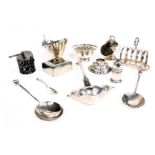 Silver plated wares, comprising toast rack, sugar bowl, ladle, cigarette box, mining log, and axe, a