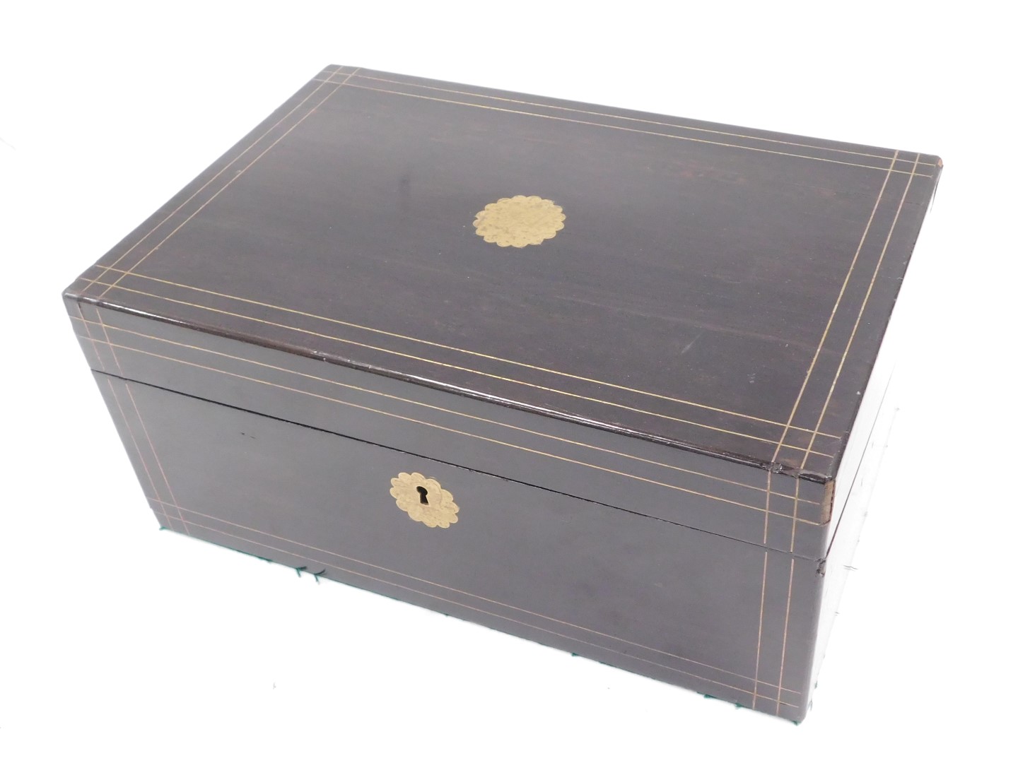 A Victorian ebonised and brass inlaid writing box, the hinged top with vacant flower head shaped car