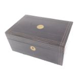 A Victorian ebonised and brass inlaid writing box, the hinged top with vacant flower head shaped car