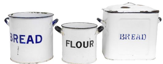 Three 20thC enamel bins, comprising a rectangular bread bin on a white ground with blue border, 30cm