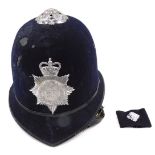 A Gloucestershire constabulary police helmet. (AF)