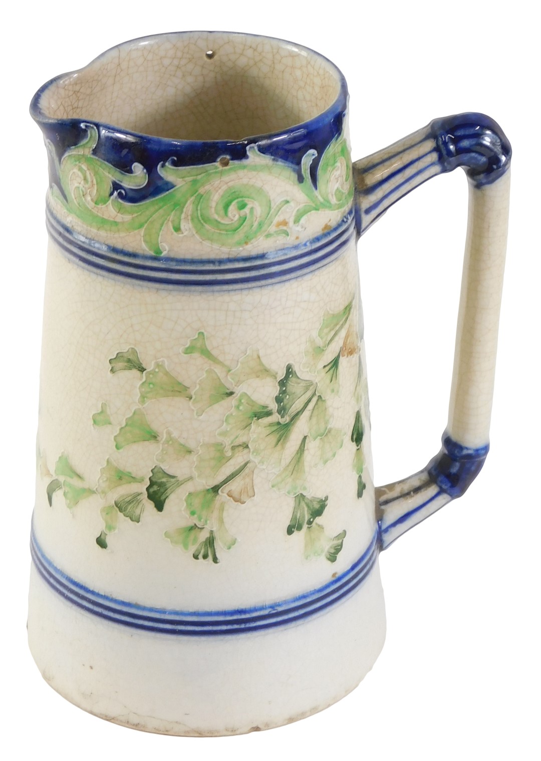 A Macintyre Burslem Company 19thC lemonade jug, with a dark blue border and green flowers, stamp to