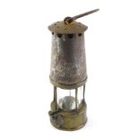 A steel and brass miner's lamp, lacking plate, possibly Protector Type 6, 26cm high.